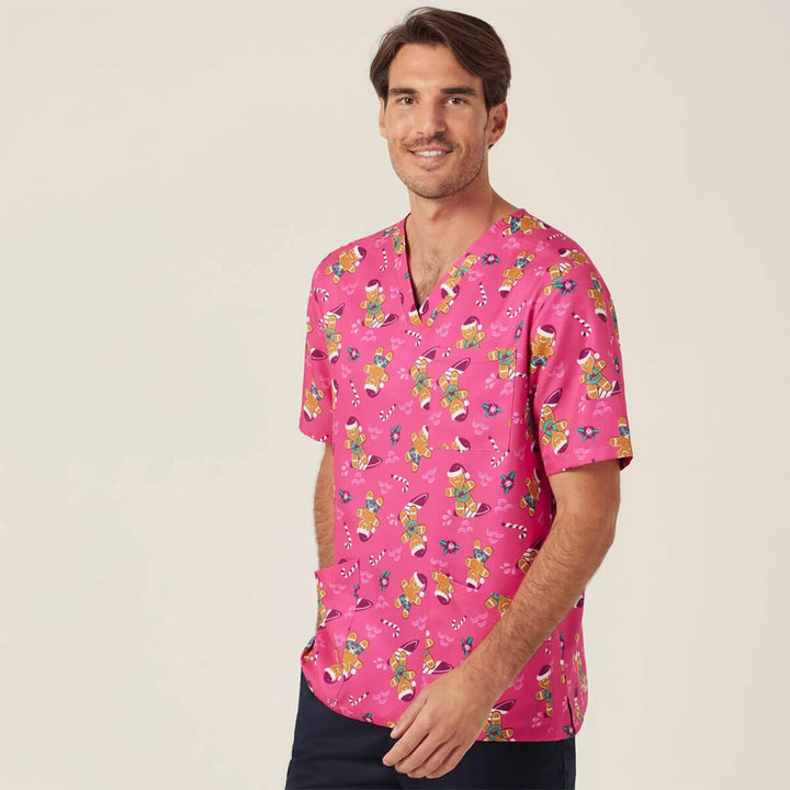 NNT CATUXV XMAS Gingerbread Surfer Print Scrub Top Pink worn by man