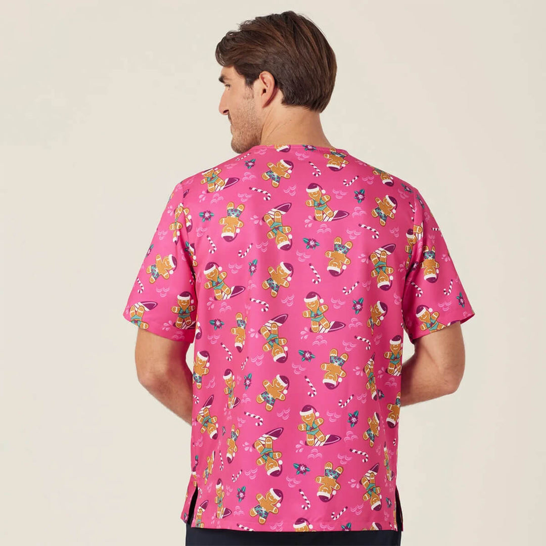 NNT CATUXV XMAS Gingerbread Surfer Print Scrub Top Pink worn by man back