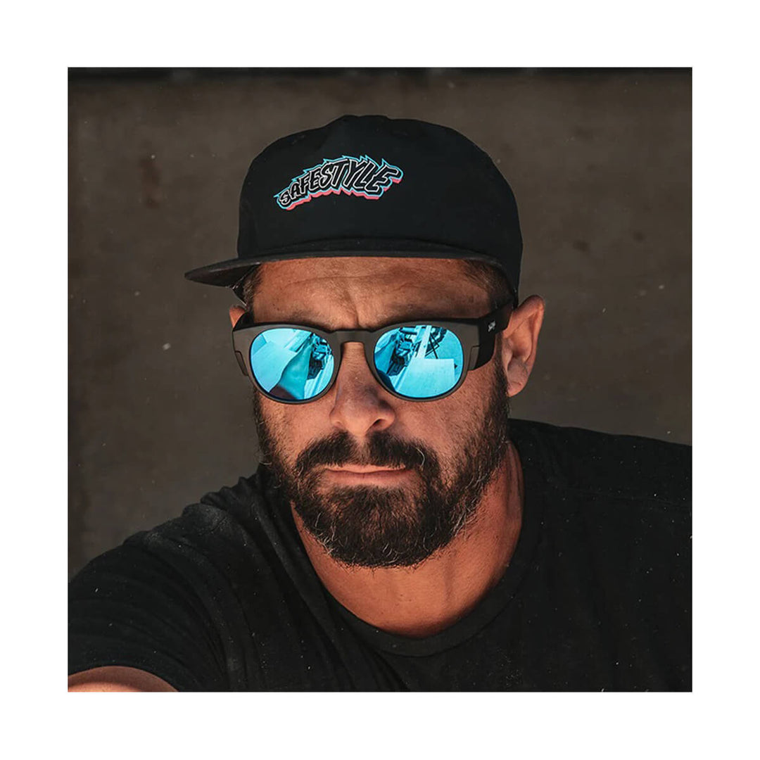 SafeStyle Cruisers Matte Black Frame Mirror Blue Polarised Lens worn by man in cap